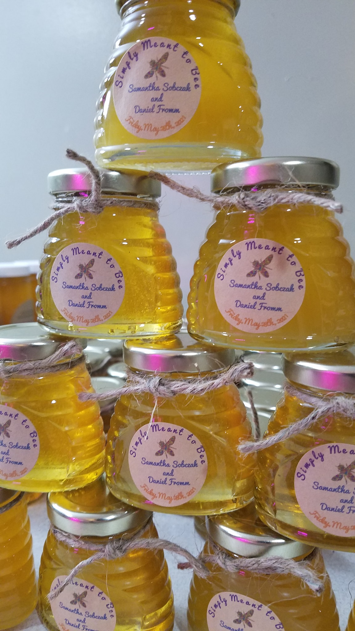 Small honey favor jars prepared for customers